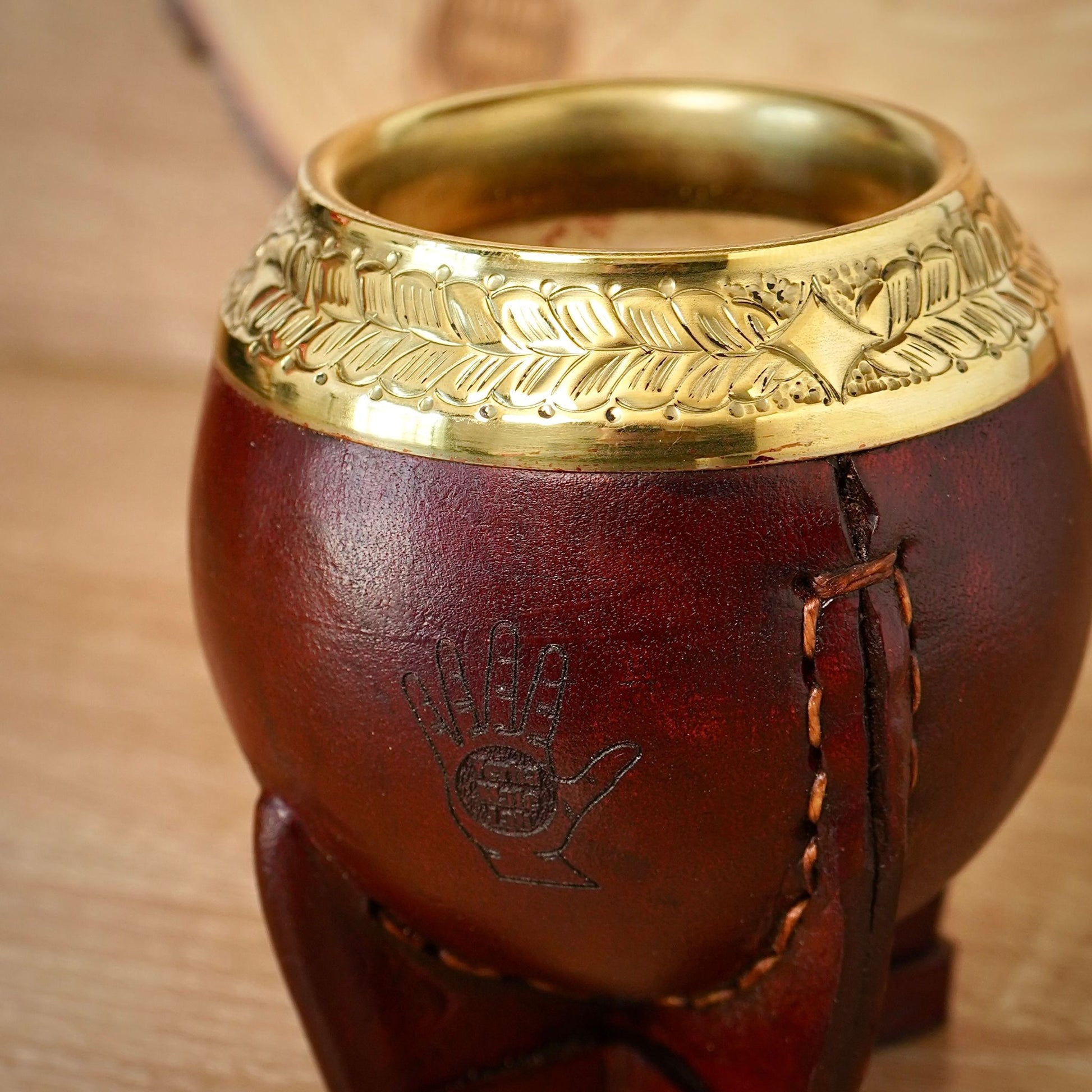 brown torpedo gourd with bronze rim